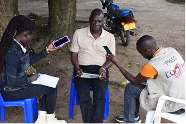Commissioner Epitu during a media interview in Pader District